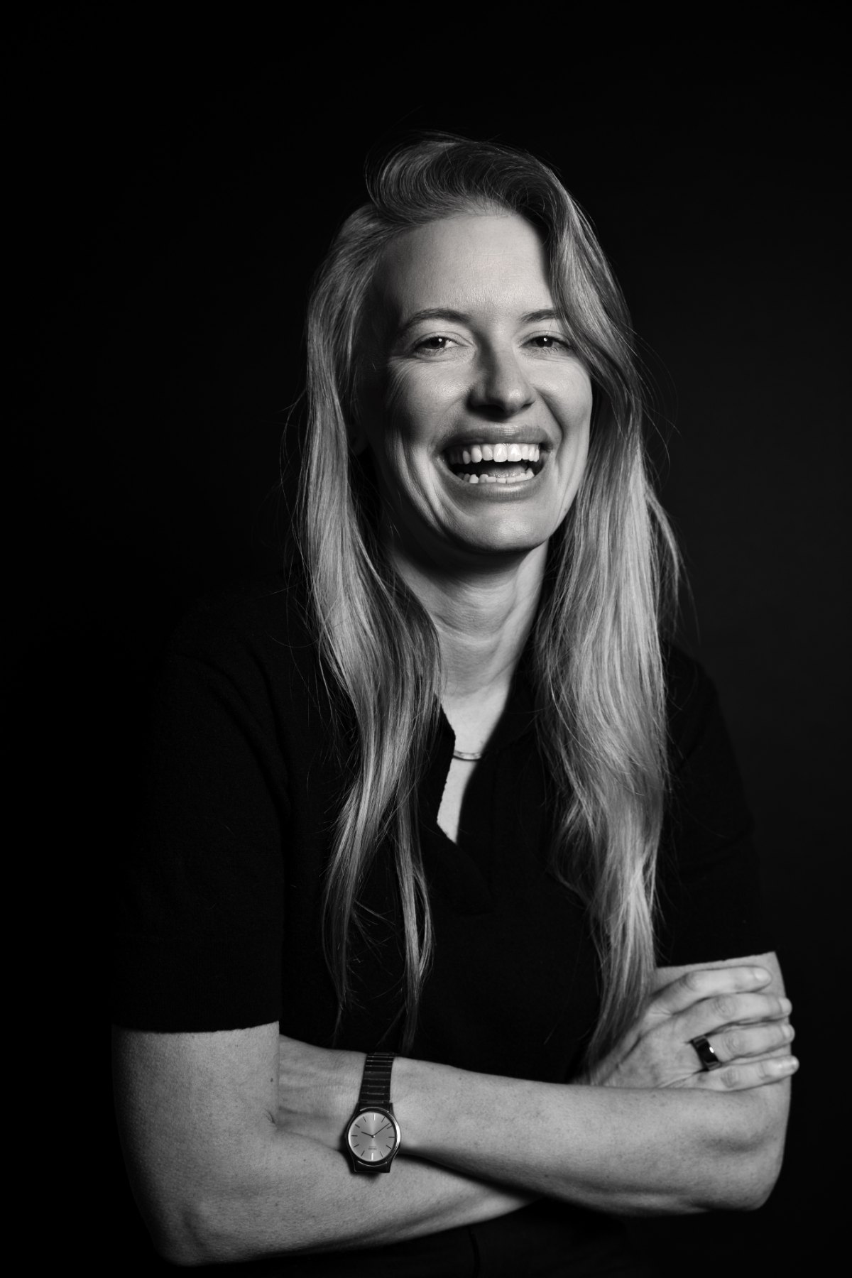 Bridget Hilton laughing, black and white portrait