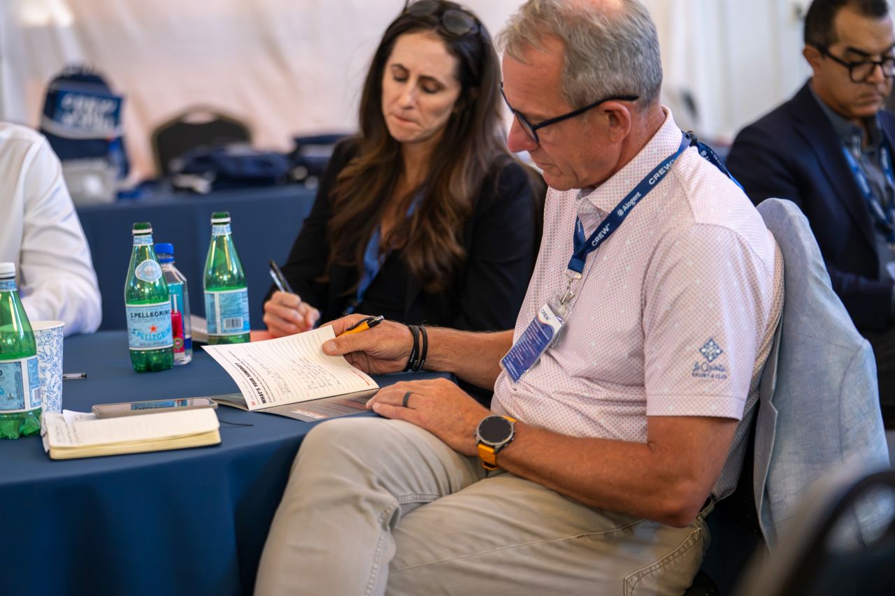 A table of participants in conversation
