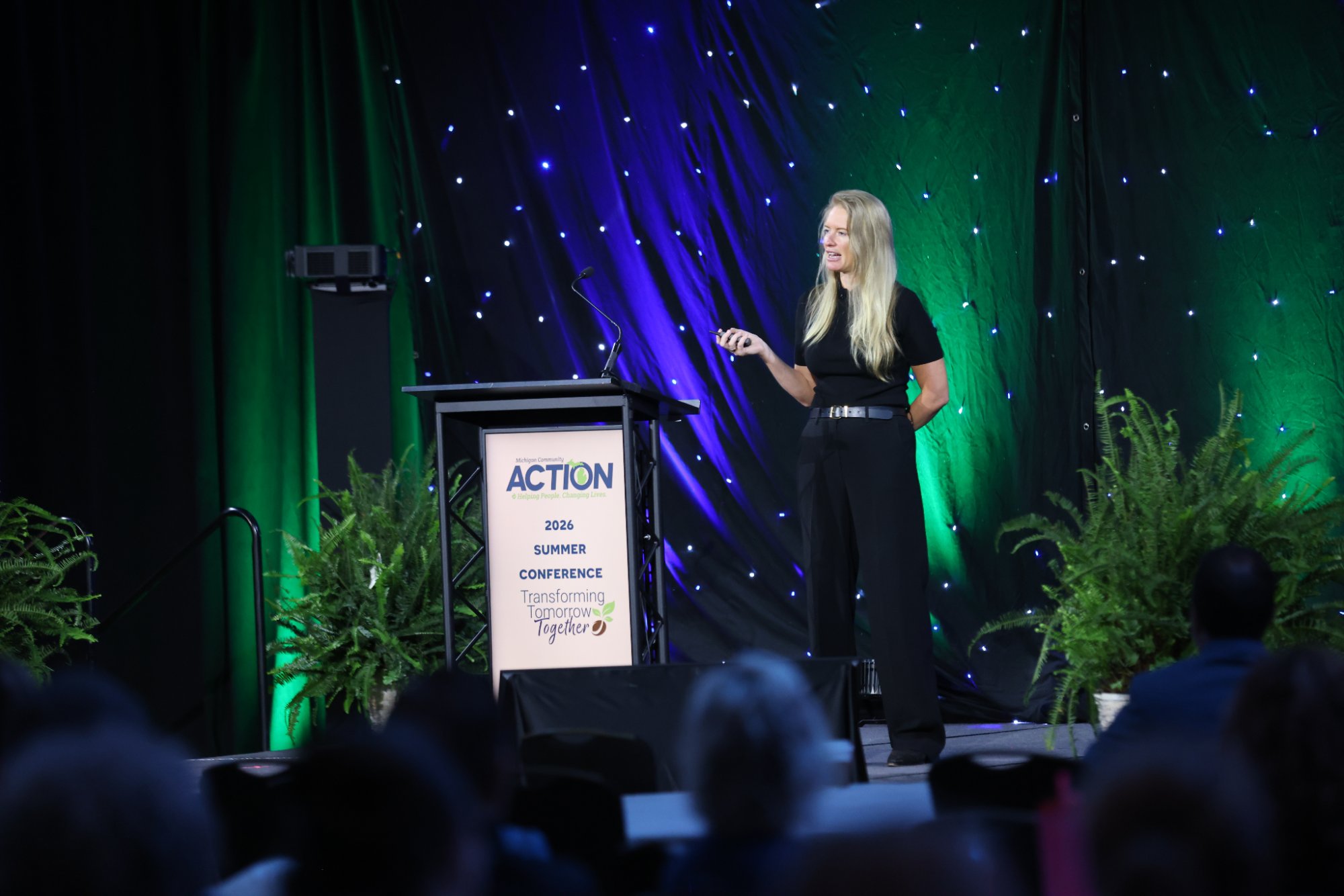 Bridget Hilton speaking at the Michigan Community Action Summer Conference